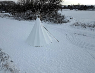  teepee tent is equipped on the inside with furniture for groups of children in kindergarten. outdoor lessons combined with games in the meadow and drawing will not hurt, above © Michal