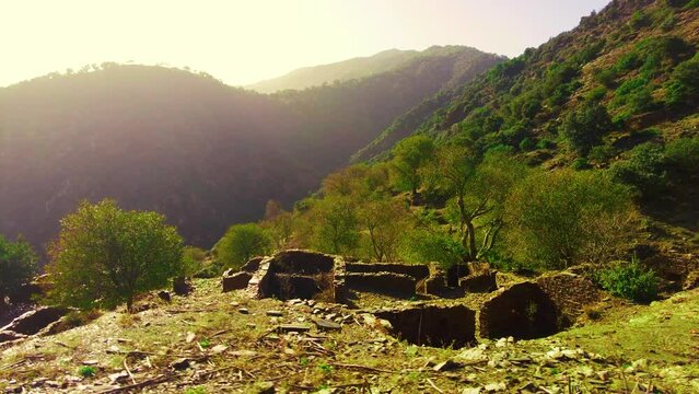 the ruins of an old village at the top of the mountain in Algeria