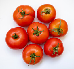 Fresh and Juicy Tomatoes on isolated on white background - organic tomatoes.