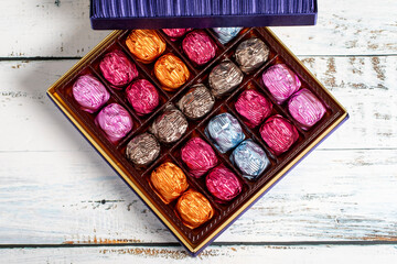 Packaged chocolate. Luxury chocolate on white background. Top view