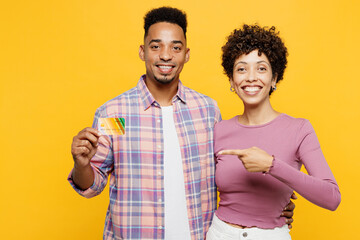 Young couple two friend family man woman of African American ethnicity wear purple casual clothes...