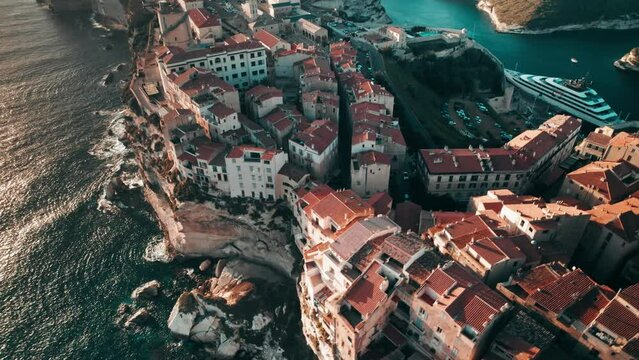 aerial, drone flying above Bonifacio at sunset, Corsica