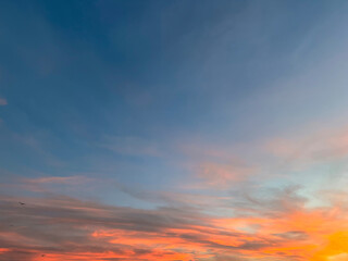 Fototapeta premium Dramatic sunset sky with colorful clouds background concept. Evening sunset. Twilight sky.