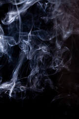Smoke motion on black background. - 692937814