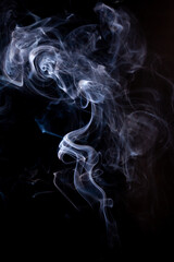 Smoke motion on black background. - 692937821