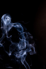 Smoke motion on black background. - 692937827