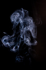 Smoke motion on black background. - 692937828