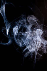 Smoke motion on black background. - 692937830