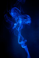Blue smoke motion on black background. - 692937846