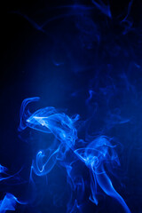 Blue smoke motion on black background. - 692937849