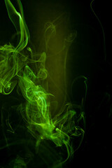 Green smoke motion on black background. - 692937866