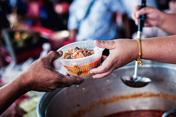 concept of charity food for the poor : the concept of life problems, hunger in society : Helping...