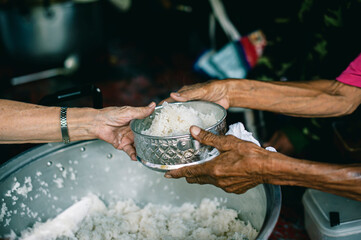 concept of charity food for the poor : the concept of life problems, hunger in society : Helping...