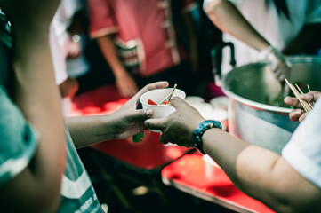 concept of charity food for the poor : the concept of life problems, hunger in society : Helping...