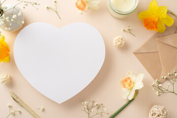 Share the joy of spring festivities with daffodils and gypsophila. From above, observe flower branches and envelope on beige isolated background with empty heart frame ideal for adverts or text