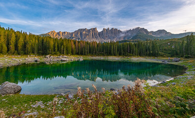 Lago di Carezza, emerald waters, enchanting Spruce forests, Latemar mountain vistas. A gem in South Tyrol and the Dolomites, captivating in every frame