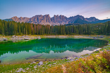 Lago di Carezza, Emerald waters, misty forests, Latemar views, an Alpine masterpiece. Beloved in South Tyrol, explore the guide for essential tips
