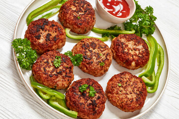 german frikadellen of ground meat on a plate