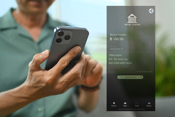 Man using banking app or service on smartphone for transferring money or paying bills