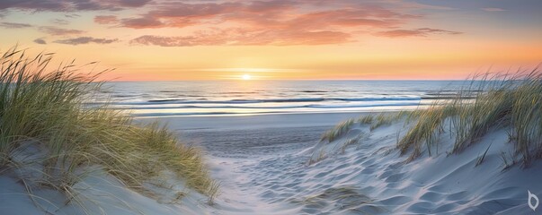 Capturing beauty of coast. Sunset at beach. Sun dips below horizon casting warm glow on sand dunes and gentle waves. Idyllic seascape with calm waters and colorful sky invites reflection and peace - obrazy, fototapety, plakaty