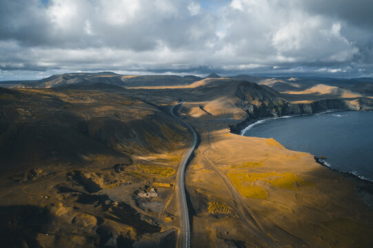 Golden Horizon: Aerial Panorama of Iceland's Coastal Majesty at Sunset