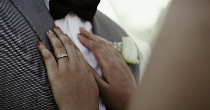 Couple, hands or event for wedding, commitment or marriage union in ceremony with closeup. People, bride and groom getting married for love, celebration and support with ring, bond or trust