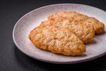 Delicious fresh fried minced fish or chicken cutlets with spices and herbs