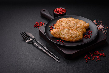 Delicious fresh fried minced fish or chicken cutlets with spices and herbs