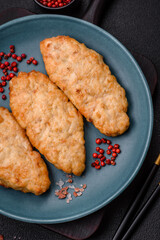 Delicious fresh fried minced fish or chicken cutlets with spices and herbs