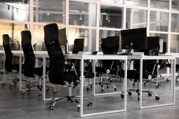 Comfortable office chairs and tables in meeting room