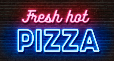 Neon sign on a brick wall - Fresh hot pizza