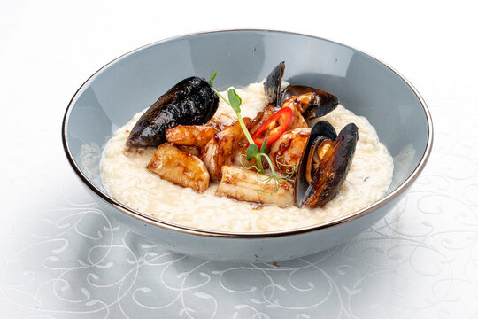 Risotto with seafood: shrimp and mussels. Isolated image
