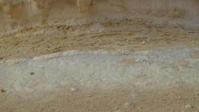 Textured rock formations under threat of demolition, Riffa, Al Janūbīyah, Bahrain.