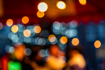 A mesmerizing Christmas bokeh background featuring a vibrant array of festive colours. The...