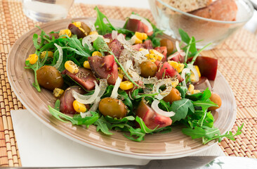 Fresh vegetarian healthy vegetable salad with arugula
