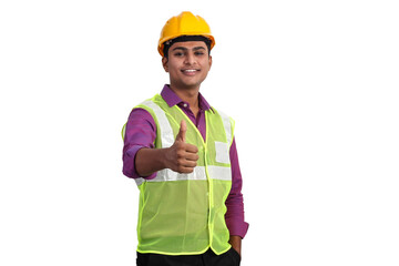 Indian male architect wearing yellow helmet and safety jacket showing thumbs up in studio.