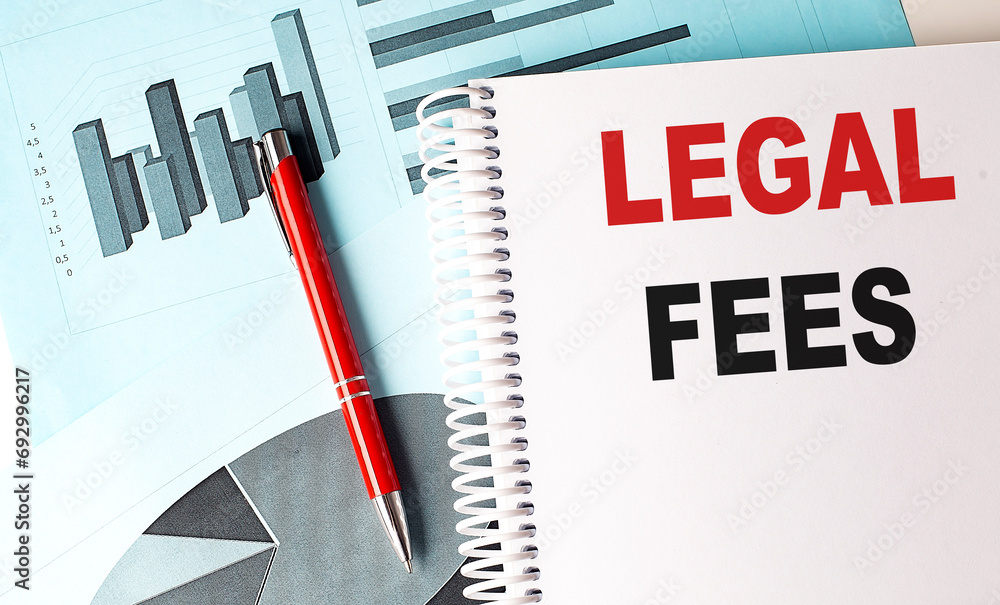 Poster legal fees text on a notebook with pen on a chart background