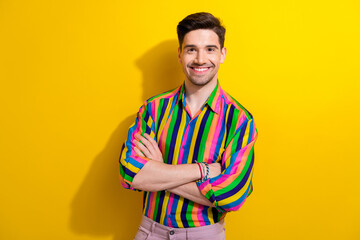 Photo of young confident businessman in exclusive expensive striped shirt folded arms waiting...