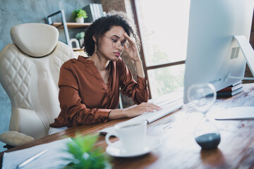 Photo of exhausted it specialist lady fell asleep drowse sitting chair networking modern business...