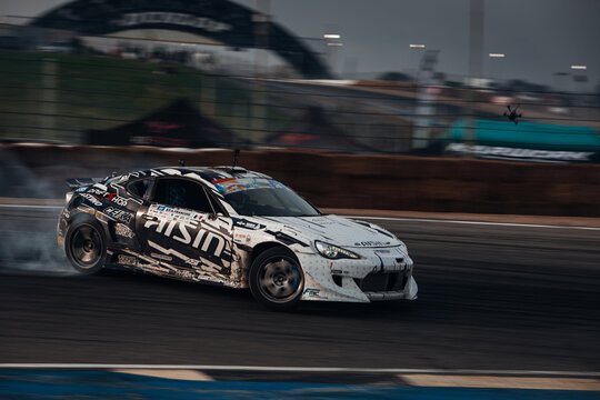 Toyota GT86 go fast in drift with a cloud of smoke