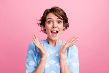 Photo of nice impressed cheerful person raise opened arms palms cant believe news isolated on pink color background