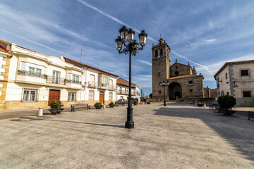 Church and lampposts at Mayor square in Navamorcuende on a sunny day. Toledo. Spain. Europe.
