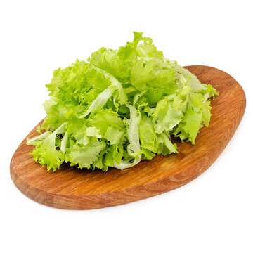 Frisse salad on a wooden board on a white background, isolated