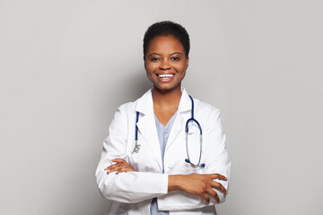 Confident female doctor medical worker on white background