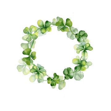Circle frame with shamrock and clover watercolor illustration isolated on white background. Painted green four leaves. Hand drawn Irish symbol. Design element for St.Patricks day postcard, package