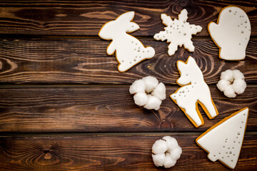 Fototapeta na wymiar Homemade baked white Christmas cookies, top view. New Year background