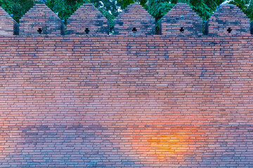 Chiangmai Chiang mai old city brick wall. the castle wall was built to protect the city surrounded...