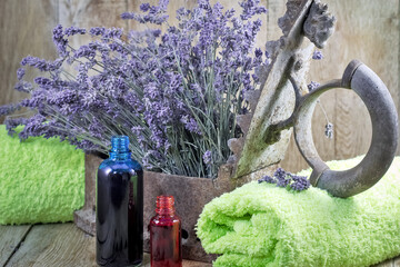 Essential lavender oil in bottle,  massage treatment and arromatherapy, spa still lifE - 693031296