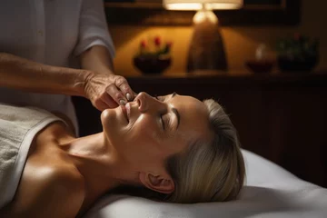 Stickers pour porte Salon de massage Facial massage for woman in spa