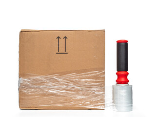 Cellophane dispenser for packaging. Cellophane for packaging cardboard boxes isolated on a white...